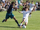 PREP SOCCER: Viking boys fight off smoke, rally past Timberwolves