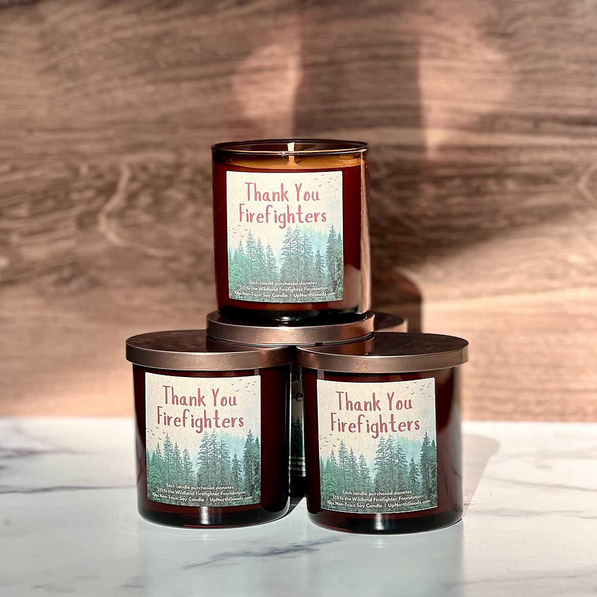 Up North Goods' candle that is dedicated to the firefighters that fought the Sunset Fire in Bonner County.