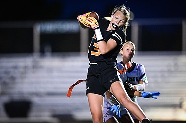 Flathead wide receiver Lexi Herion (33) holds on to a long reception against Glacier at Legends Stadium on Wednesday, Sept. 17. (Casey Kreider/Daily Inter Lake)