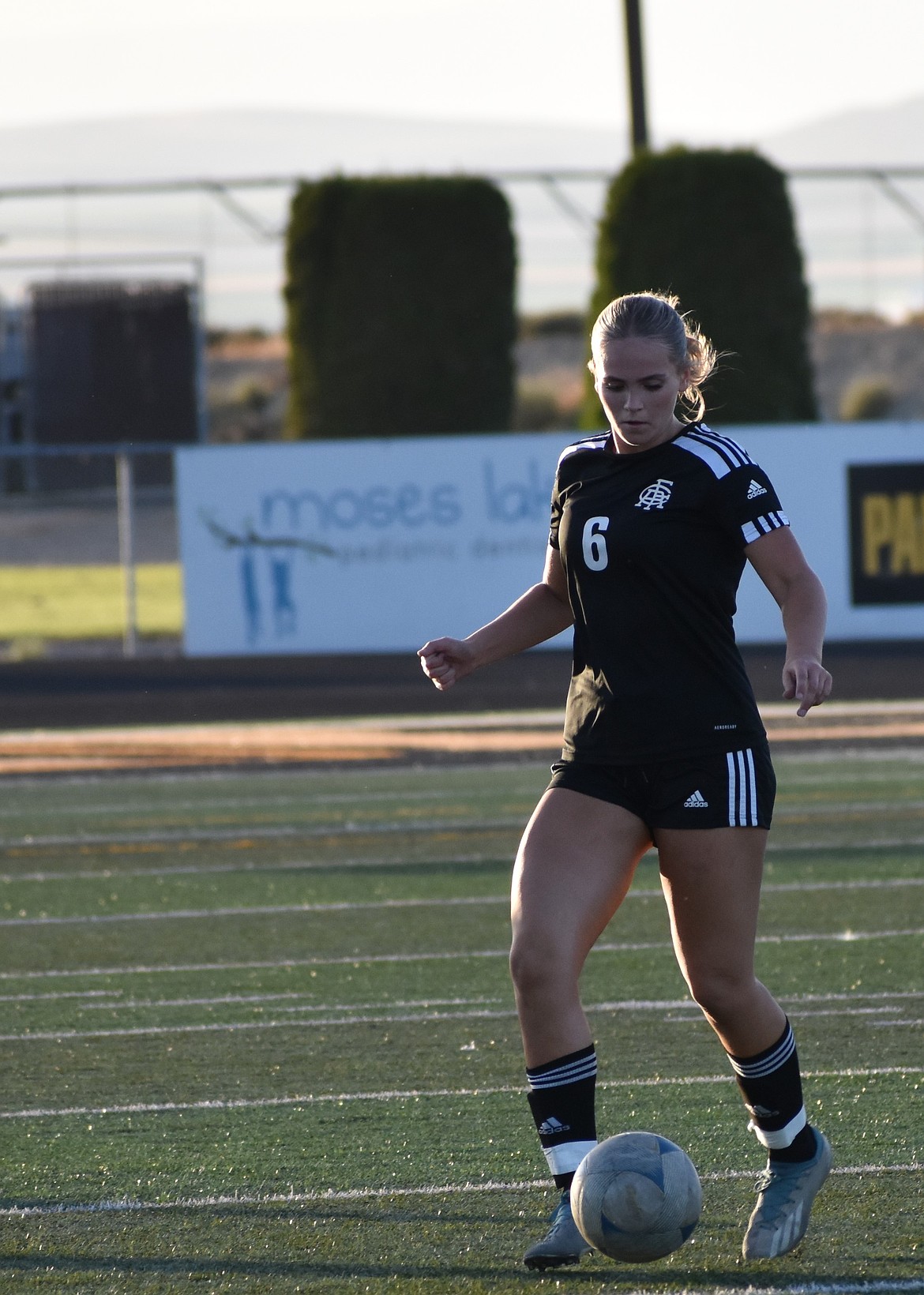 Senior Emily Piercy with the Knights carries the ball along the midfield during the first half of the game against Naches Valley. Head coach Jens Jensen said the team had to make important adjustments during halftime in order to win the game.