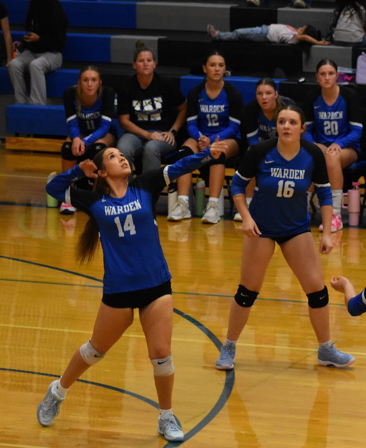 Cougars’ senior Miranda Martinez (14) gets ready to make a strong hit back to La Salle while her teammate Lindsey Grubb (16) keeps her eye on the play. Head coach Katie Roylance said the team just needs to fine-tune things in the coming days as they prepare for their next opponent.