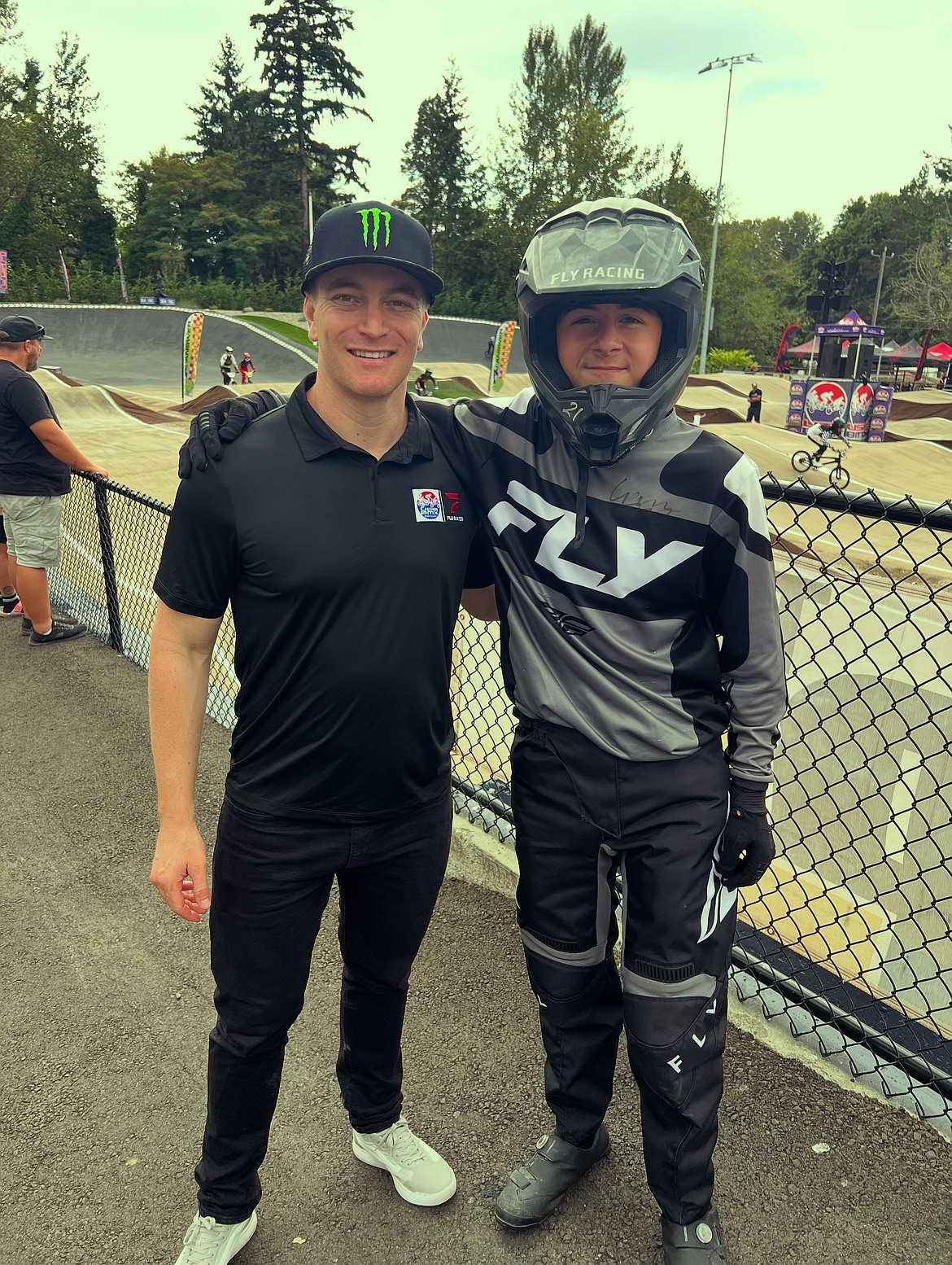 Connor Fields, left, and KJ Gilman, right, pose for a photo at the northwest Gold Cup Final in Seattle. Fields is a 2016 Olympic Gold Medalist in BMX and Gilman said he got to chat with him at the Seattle track.
