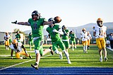 Wolfpack dominate Bruins, 56-6