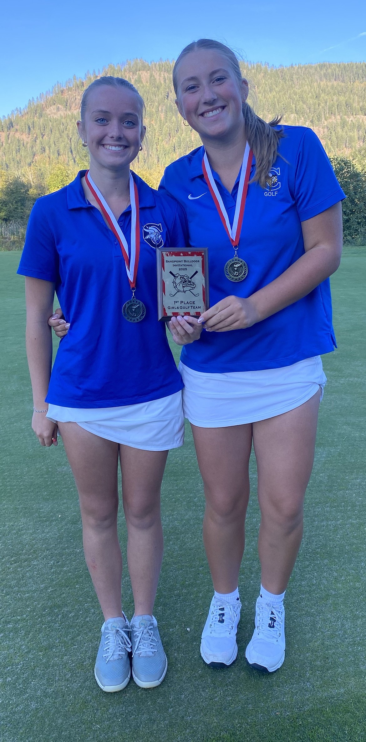 Courtesy photo
Kinsley Meier, left, of Coeur d'Alene, finished second, and Viking teammate Ella Wilson, right, was girls medalist at the Sandpoint Invitational on Monday at The Idaho Club.