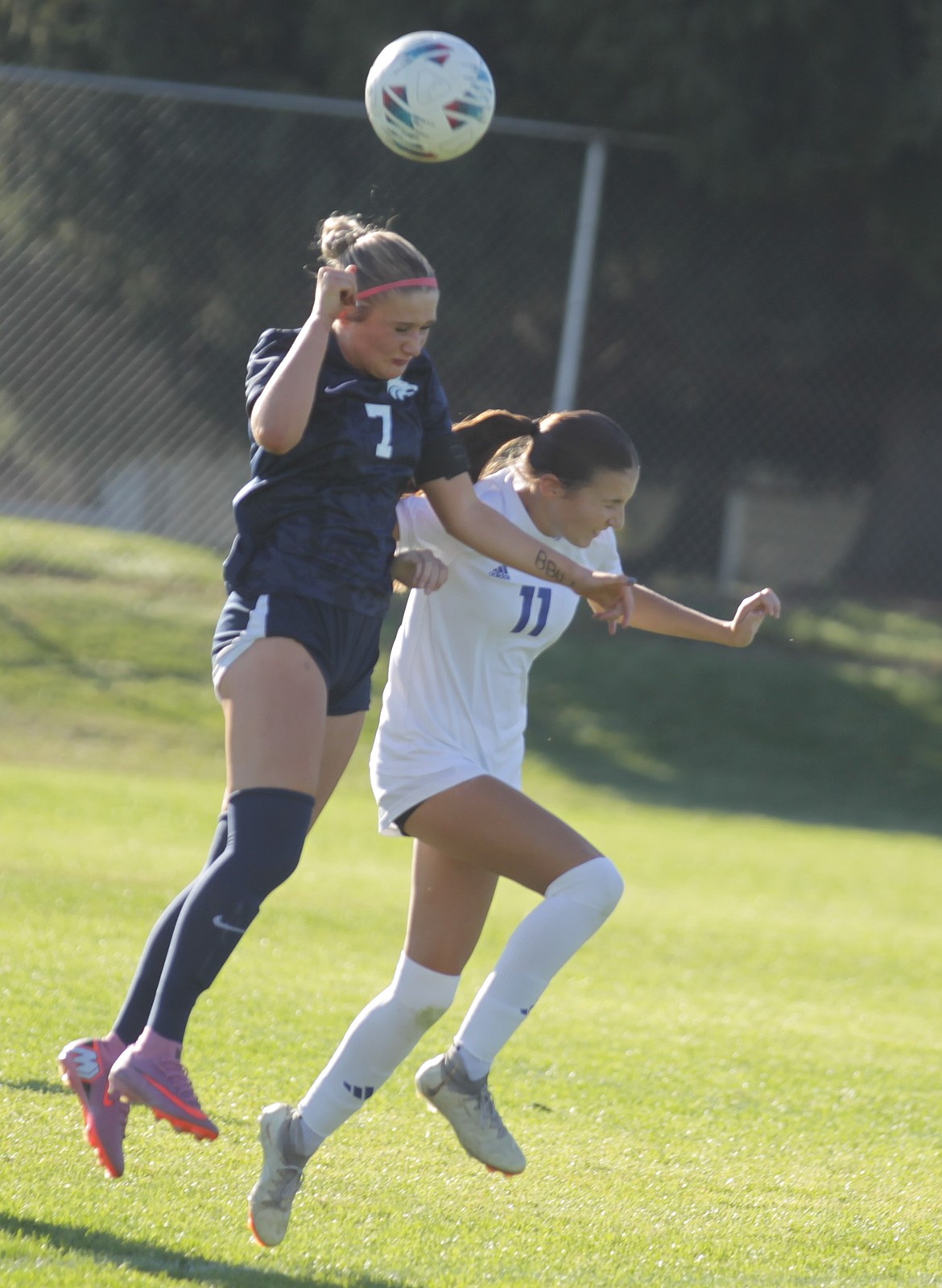JASON ELLIOTT/Press
Lake City senior defender Kamryn Kirk and Coeur d'Alene sophomore forward Grier Scott vie for the ball in the air during the first half of Tuesday's 6A Inland Empire League match at the Irma Anderl Soccer Complex at Lake City High.