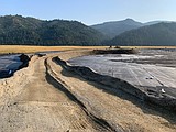 THE DIRT: CIA sludge pond capped