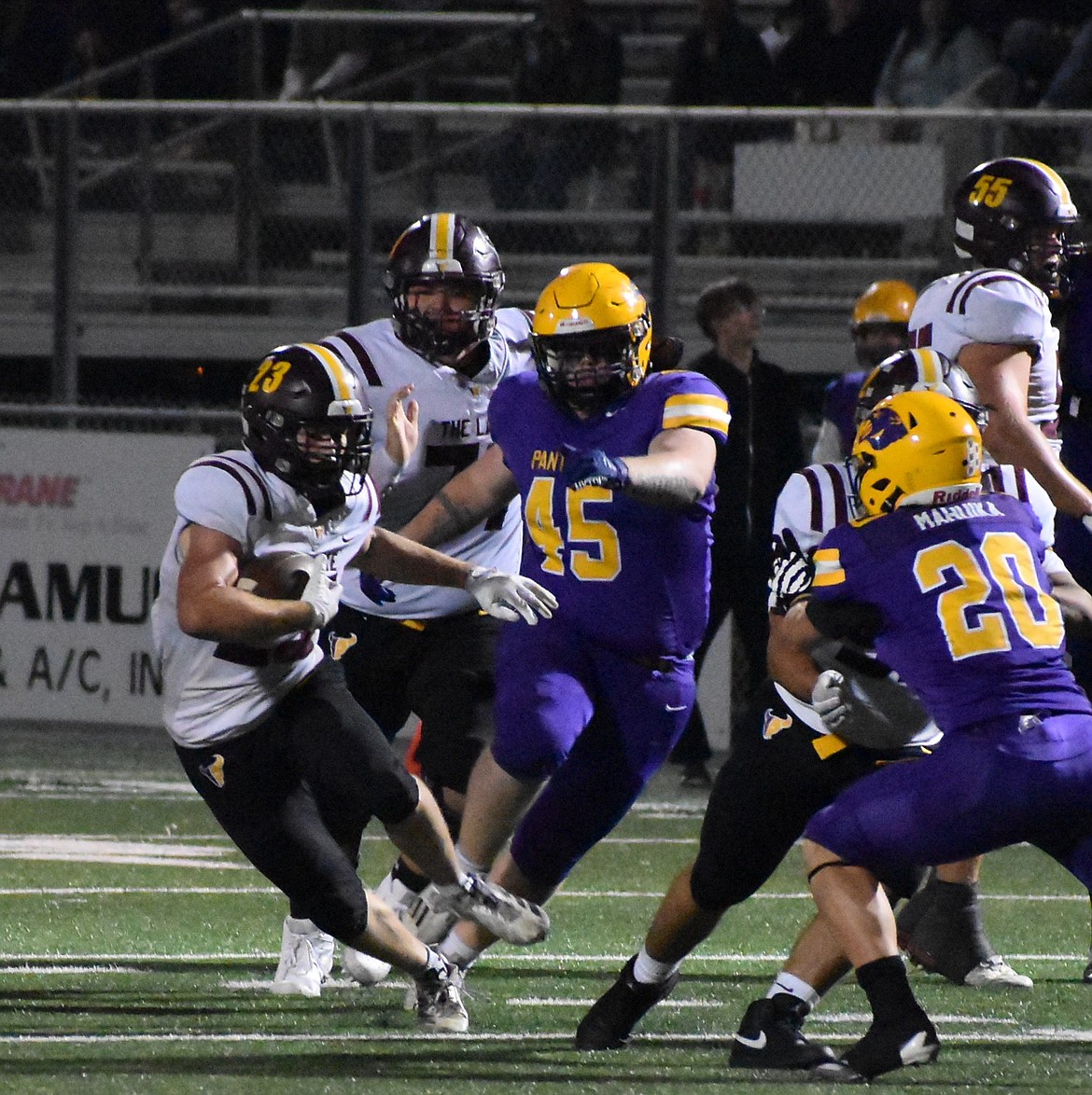 Mavs running back Elijah Burns punches down the middle and attempts to evade Wenatchee defenders. Head coach Brett Jay said the offense did a great job running out the clock once they got ahead in Friday’s matchup.