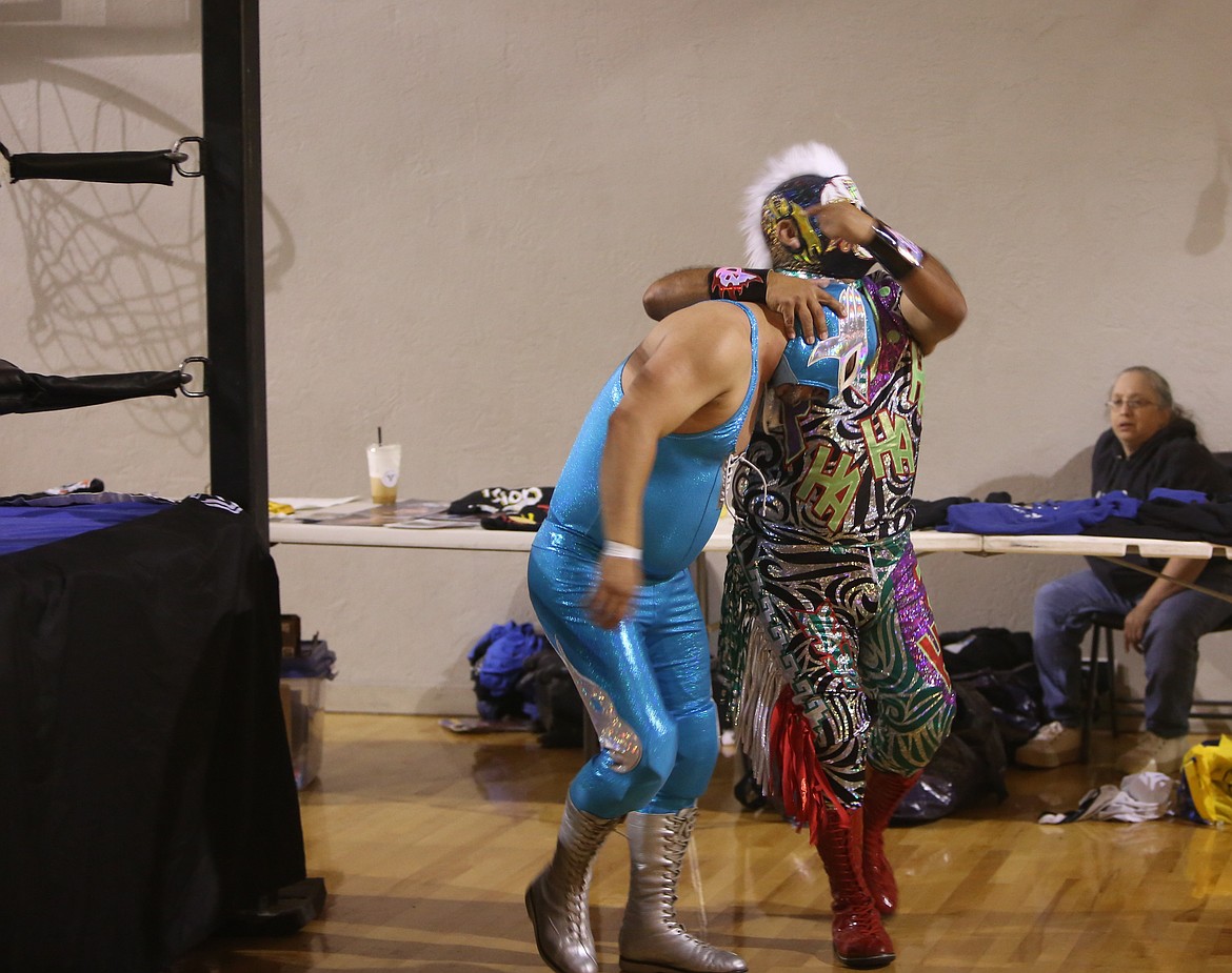Two luchador wrestlers continue their match outside of the ring during the UMANI Festival. This year’s luchador events were held in the Youth Dynamics building and had performances from Northwest Pro and Lucha Volcanica.