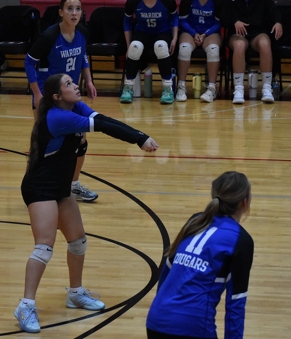 Miranda Martinez (3) of the Cougars hits the ball up after responding to a serve from the Huskies. Martinez said her team has been making improvements in each passing game and earned a confidence boost following their last victory.