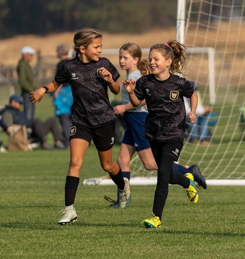 Photo by SEAN MARKS
The Sting SC 16 Girls Yellow soccer team earned its first win of the season with a 4-1 victory over Shadow SA Golay. Marlowe Rathbone led the scoring with a hat trick. Next up is this weekend’s Premier Cup in Whitefish, Mont. Pictured is Marlow Rathbone, left, and Emerson Barton.