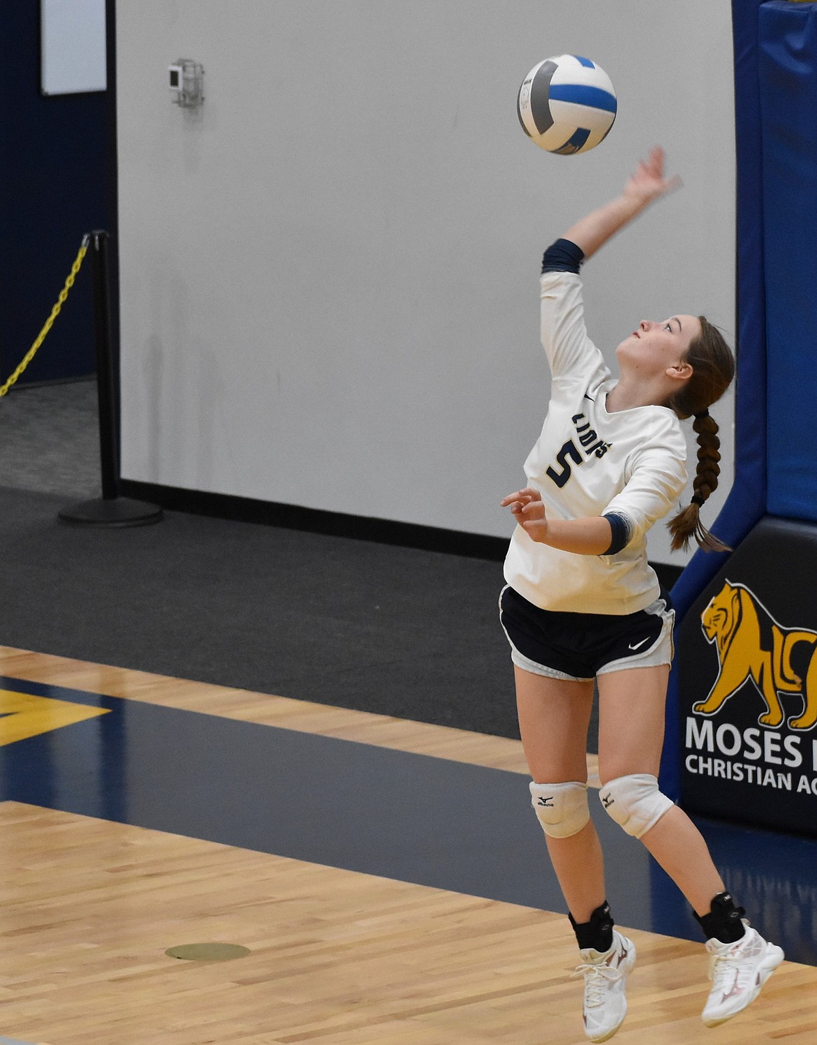 Vesta Koethke from the Lions makes a serve during the second set against the Eagles on Tuesday. Lions head coach Dean Spurbeck said the team’s overall energy coming into the game played a major part in their success.