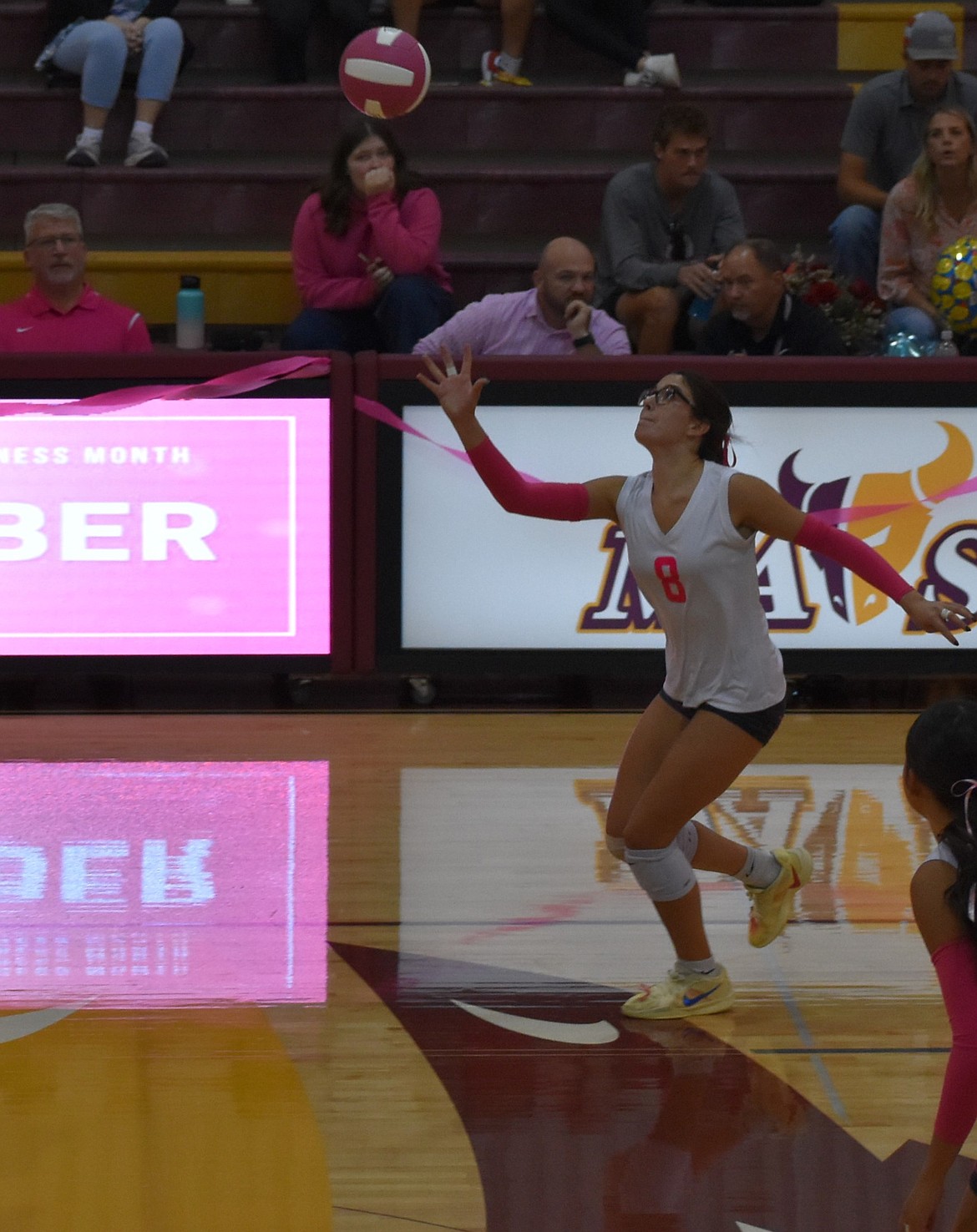 Mavs senior Caitlin Decubber gets ready to send the ball back over the net during Tuesday’s game against Eisenhower. The team’s strongest defensive performance came during the second set where they won 25-10.