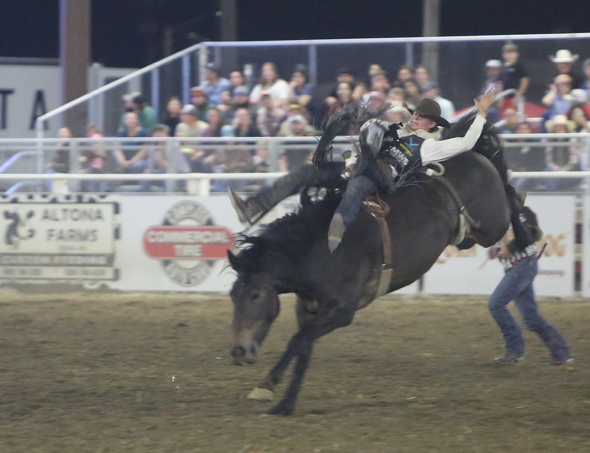 Wacey Justin Schalla holds on to his bucking horse during the bareback riding competition at the Othello Rodeo. Eight time PRCA World Champion Stetson Wright sustained injuries at the Puyallup Fair and was taken to the hospital and was released the next day but will be out for six weeks.
