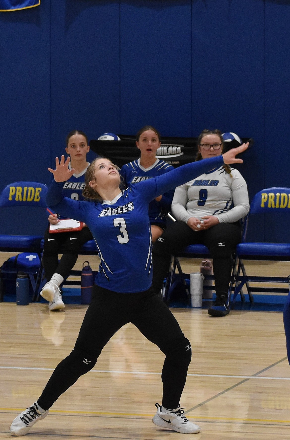 Ellie Schopf from the Eagles readies herself to make a bit hit back to the opposing Devils. Eagles head coach Niki Noble said the team needs to work on keeping their momentum going from the start of a game to the end.