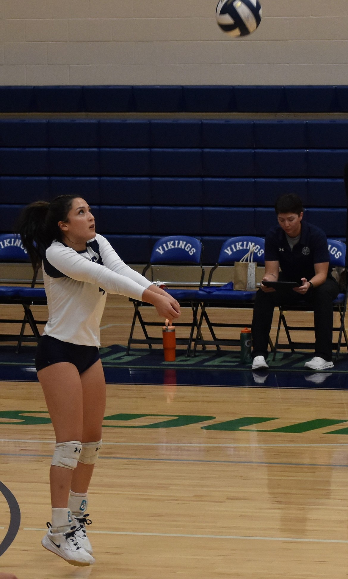 Natania Vela (4) bumps the ball back into play against Columbia Basin College on Friday. Head Coach of the Vikings Lindsey Linthicum said her team is working on their mentality going forward the rest of the season.