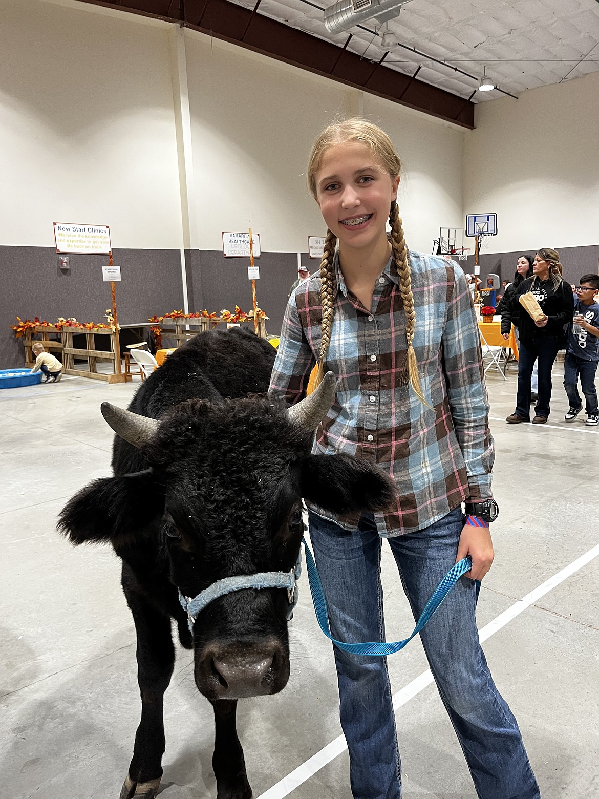 A Crestview Christian School student holds a calf at the school’s annual Fall Festival. There will be animals to pet and horses to ride at this year’s festival, which is Sunday.
