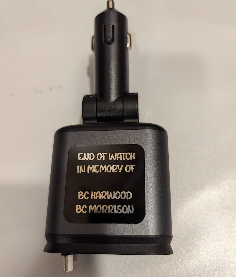 Members of local Eagles auxiliaries recently donated 140 phone chargers/adaptors to place in the rigs of first responders across Kootenai County. Each device is engraved with the words, “End of Watch — In Memory of BC Harwood and BC Morrison. You will always be in our hearts.”