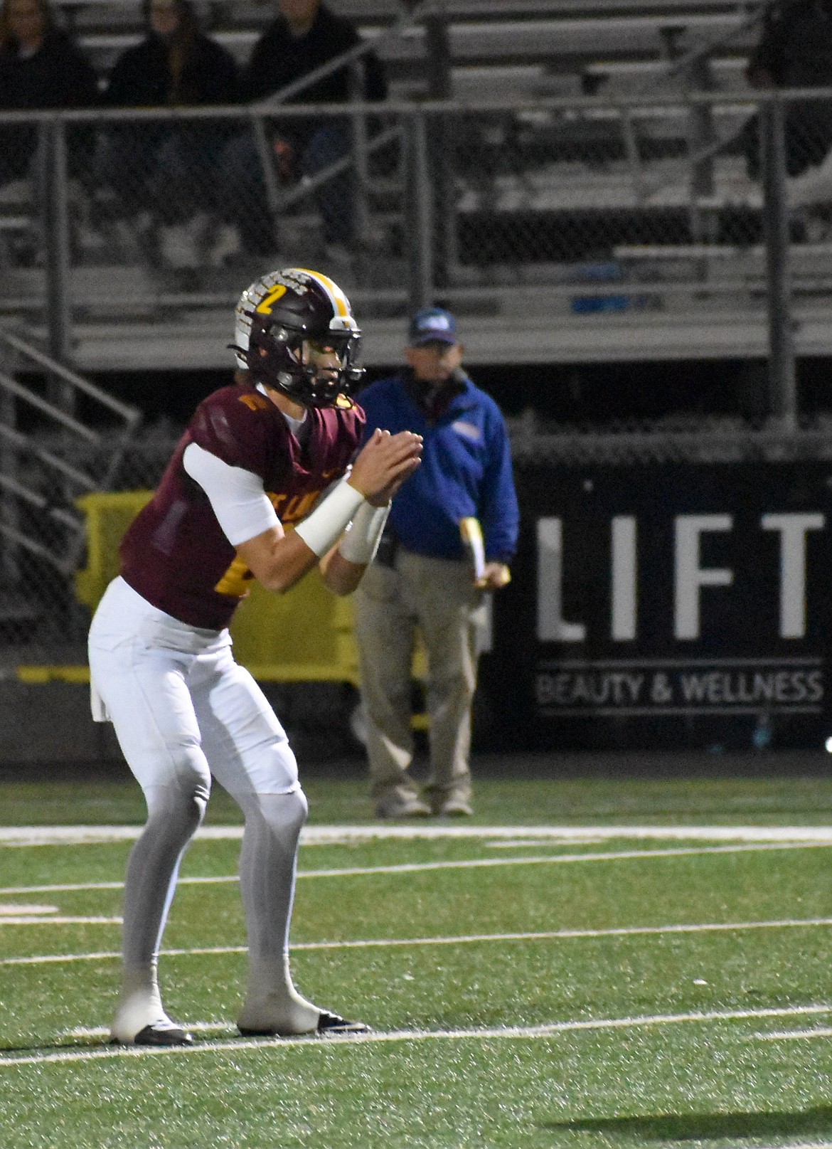 Mavs quarterback Brady Jay prepares to hike the ball during Friday’s game against Ike. Later in this play Jay would connect with Grant Smith for a touchdown.