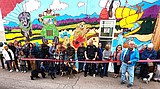 Dogs attend ribbon cutting for Art4Polson dog-themed mural