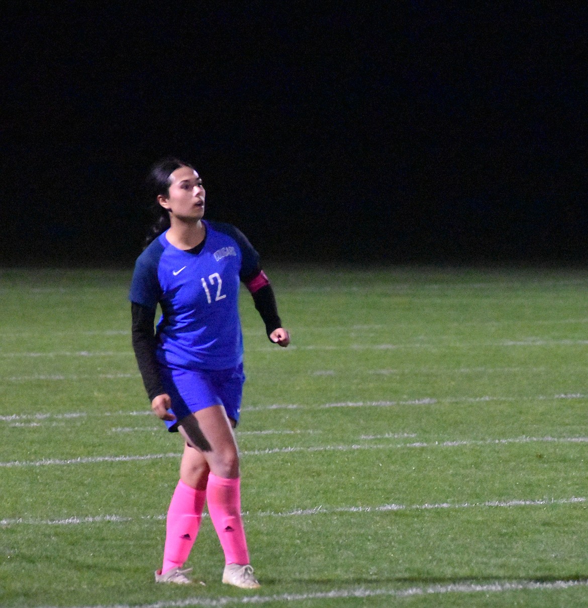 Amaia Borrego, a senior with the Cougars, completes a kick down field to one of her teammates.