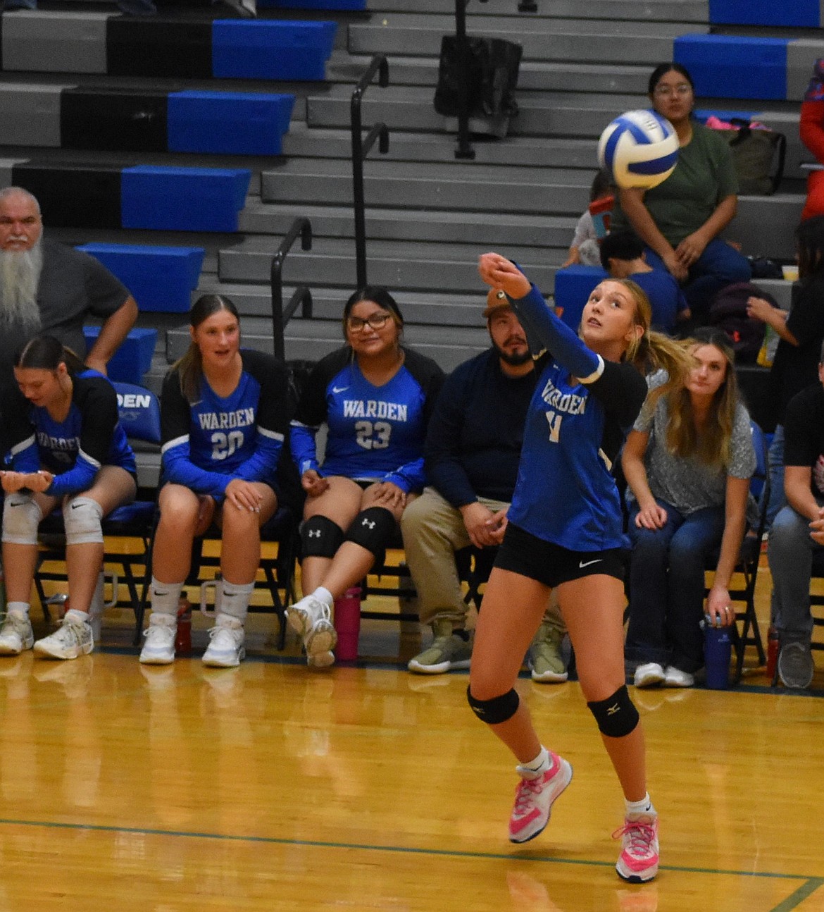Cougars player Kaleigh Secrist bumps the ball back over the net during Tuesday’s matchup.