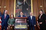 Federal government shutdown grinds into a second week, but quiet talks emerging