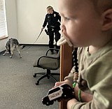 Coeur d'Alene police officer, K-9 demonstrate crime-fighting skills for Pepper Smock and family