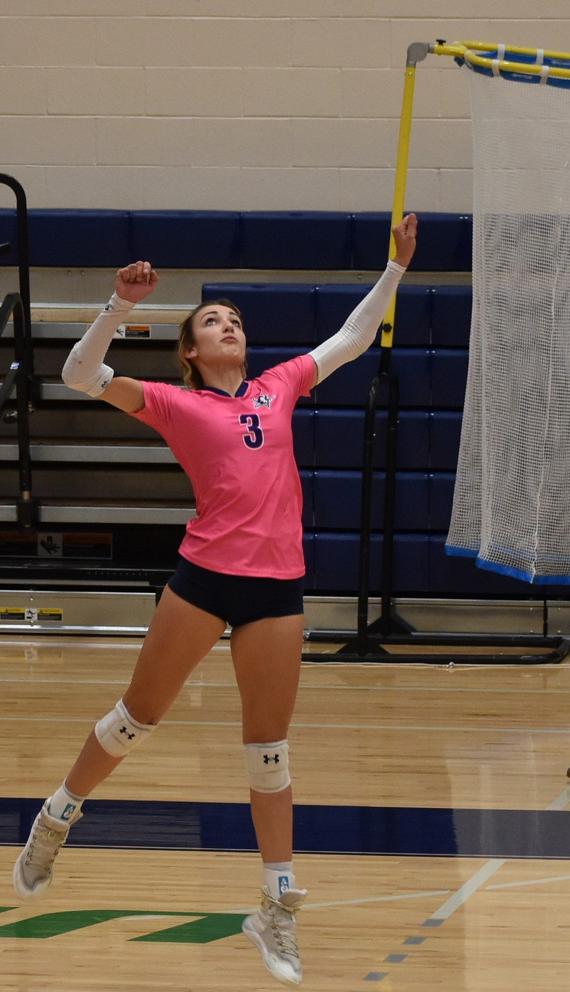 Haedynn Plum from the Vikings prepares to spike the ball against Walla Walla.