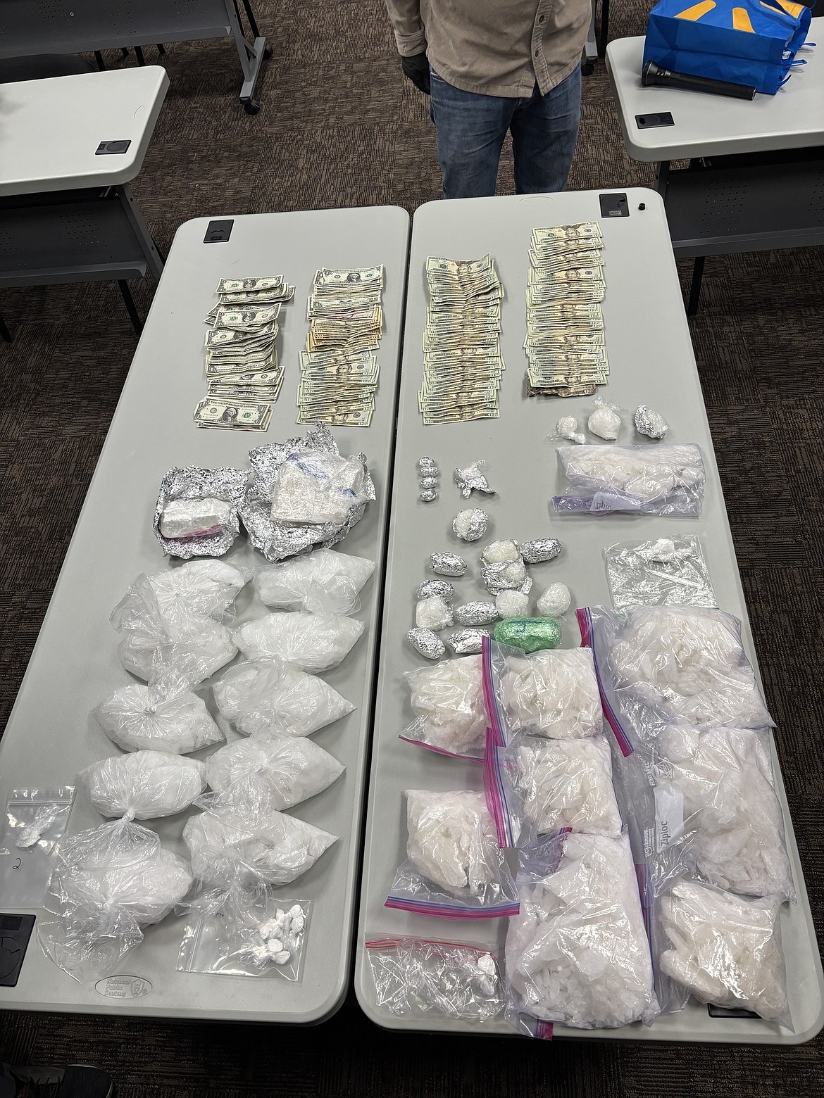 Moses Lake Police Department officer confiscated more than 20 pounds of drugs and arrested three men Wednesday night.