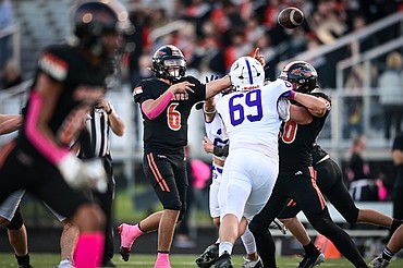 Flathead quarterback Eli Coopman (6) drops back to pass in the second quarter against Butte at Legends Stadium on Friday, Oct. 10. (Casey Kreider/Daily Inter Lake)