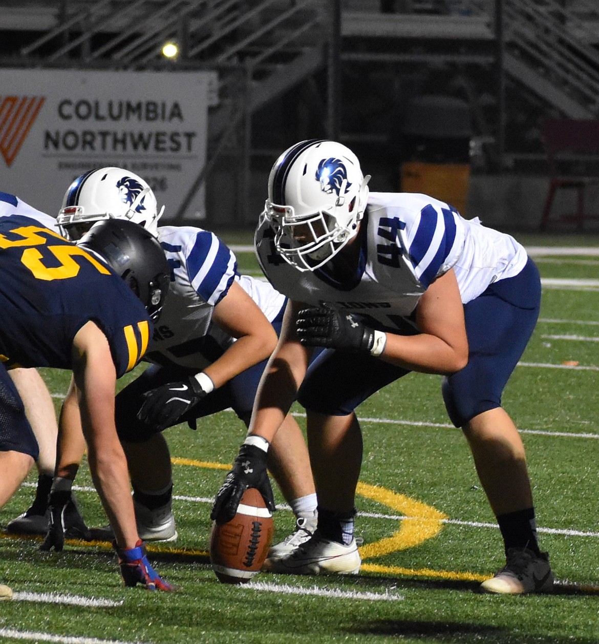 Freshman center Dane Spurbeck prepares to hike the ball during Friday’s game against Oroville. Head coach Josh Kast said Spurbeck has been very impressive as the starting center and has not had a single mishandled snap this season.