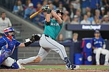 Raleigh homers, Polanco drives in 2 runs and Mariners beat Blue Jays 3-1 in ALCS opener