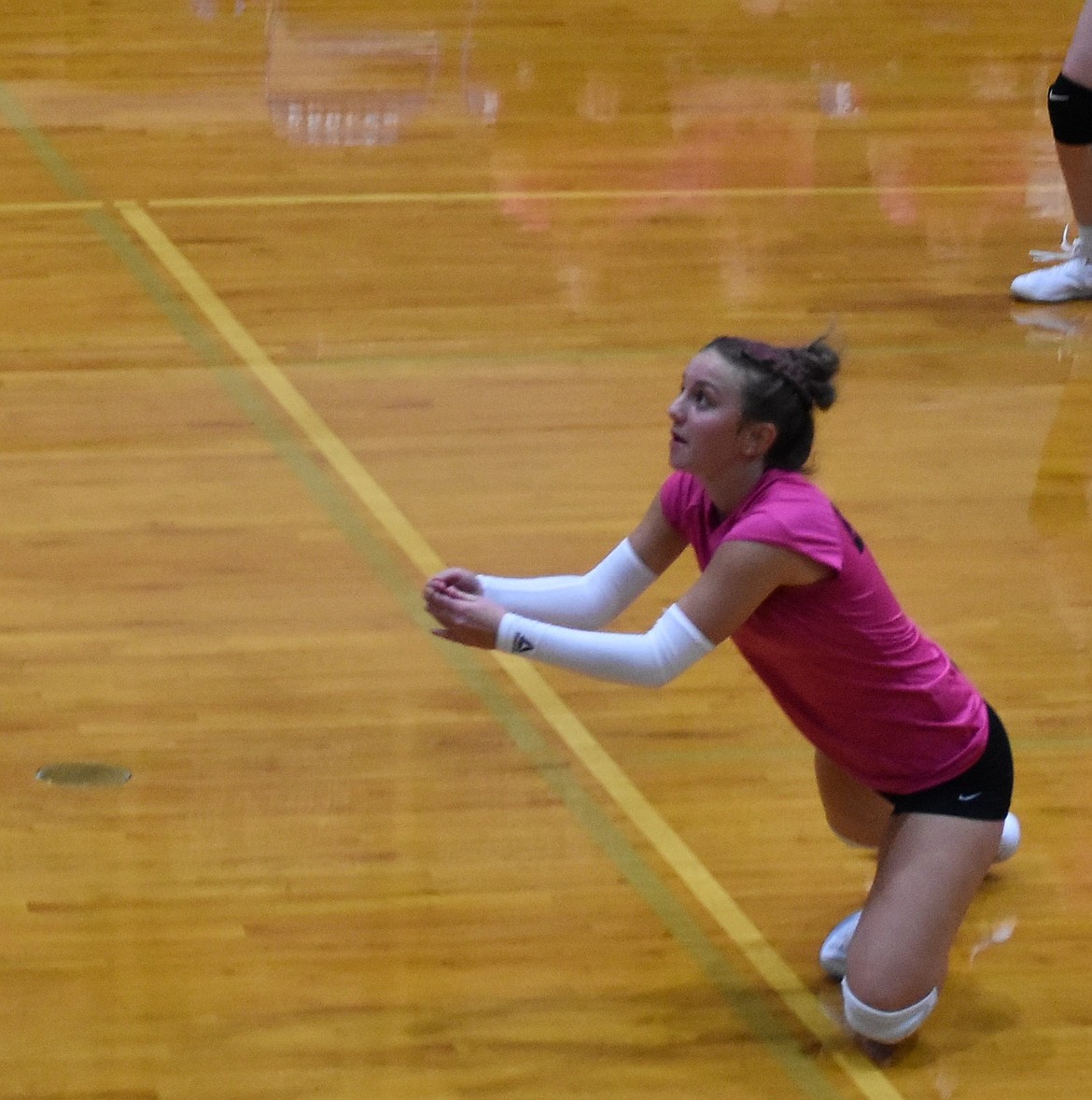 Marina Zubritskiy from the Eagles dives to hit the ball over the net during the game against Waterville-Mansfield. This week the Eagles will have their first practice since last Monday.