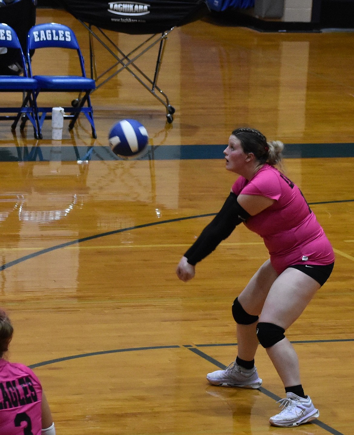 Brooke Dana, a senior with the Eagles, responds to a serve from Waterville-Mansfield during Monday’s game. Head coach Niki Noble said the Eagles have displayed a ‘never give up’ attitude this season, which has led to their success.