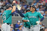 Mariners take 2-0 ALCS lead, beat Blue Jays 10-3 as Rodríguez, Polanco and Naylor homer