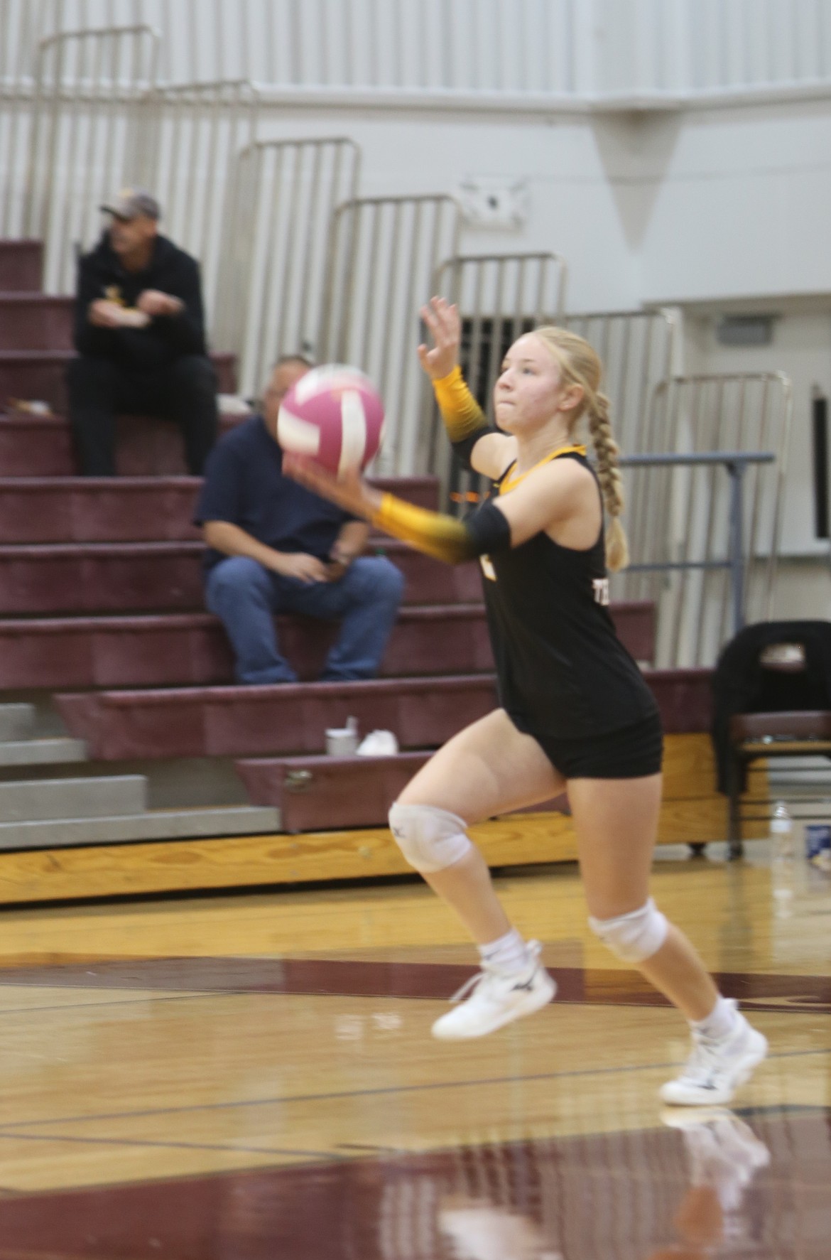 Alivia Dehoog (2) serves the ball against Davis on Tuesday. Dehoog made a hustle play to keep the ball in play against Davis.