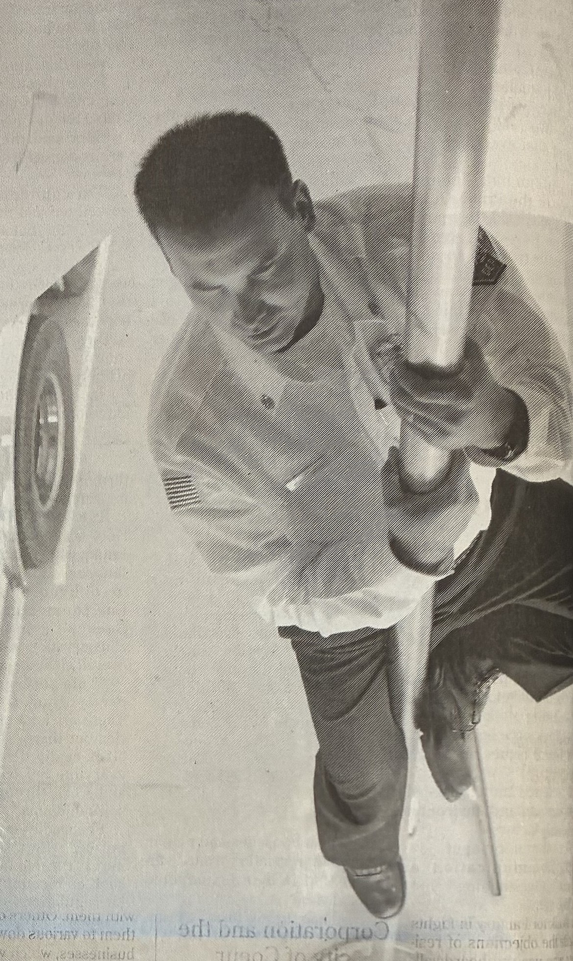 Kenny Gabriel slides down a fire station pole after being named the Coeur d’Alene department’s chief in 2000.