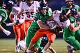 Wolfpack pile up All-State, All-Western AA football honors