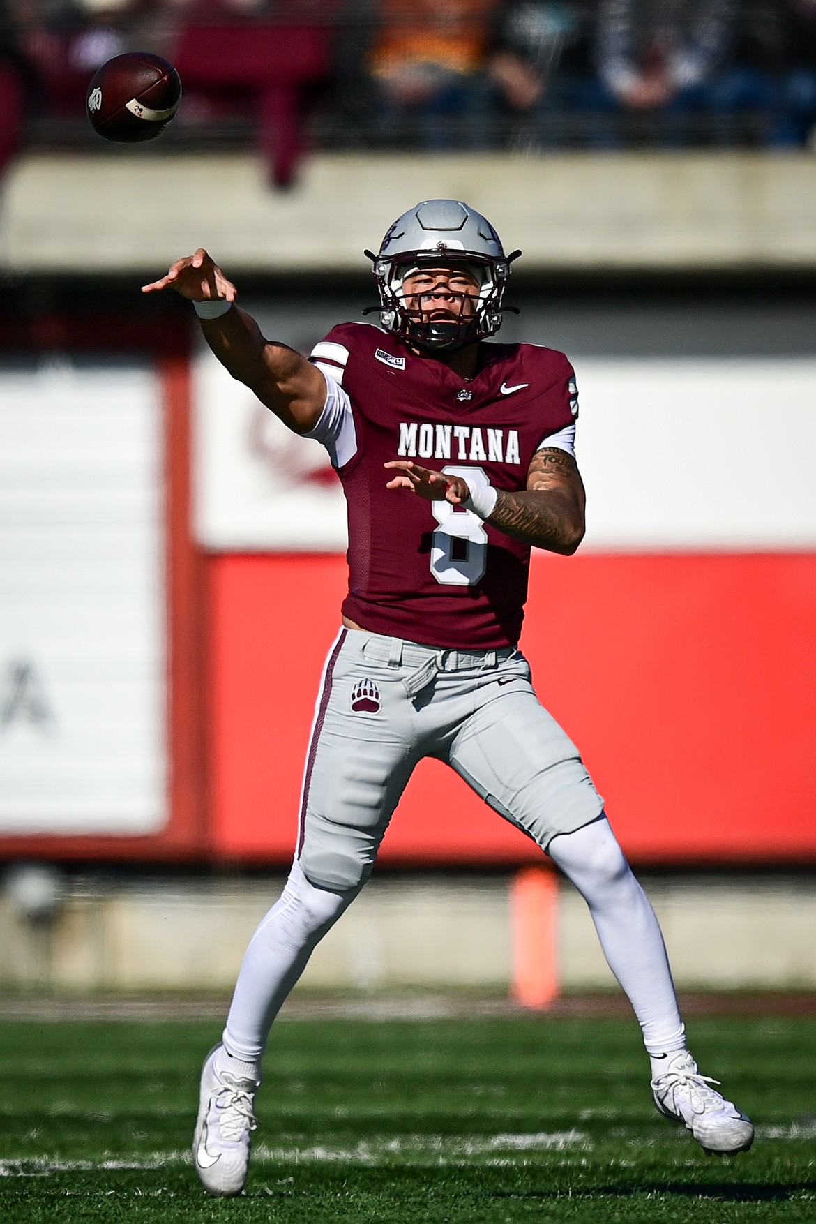 Grizzlies quarterback Keali'i Ah Yat (8) throws a 43-yard touchdown completion to wide receiver Michael Wortham in the first quarter against Sacred Heart at Washington-Grizzly Stadium on Saturday, Oct. 18. (Casey Kreider/Daily Inter Lake)