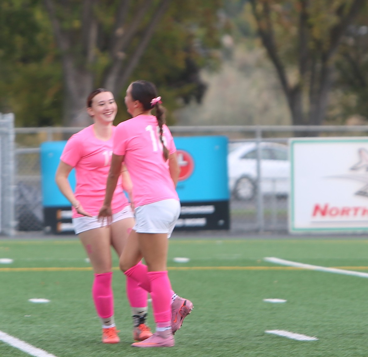 Yvanna Lawton, left, celebrates with Kamery Char, right, after their third goal of the game. Char scored two of the Mavs’ three goals on Saturday.