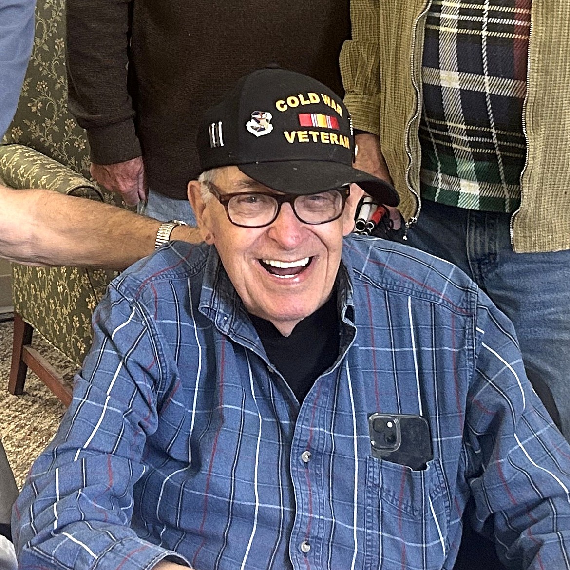 Dr. Norman Leffler laughs during the free monthly breakfast for veterans at Legends Park Assisted Living.