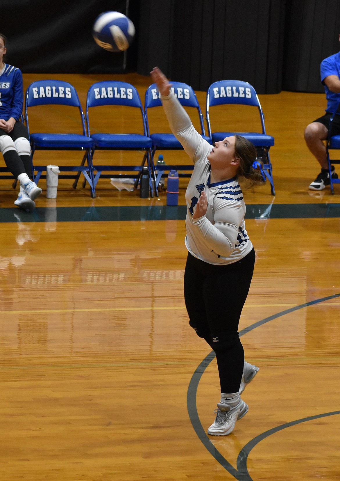 Alyson Zufall, a senior for the Eagles, hits the ball back over the net against the Lions. The Eagles Senior Night brought in a large crowd which Eagles head coach Niki Noble said helped the flow of the game.
