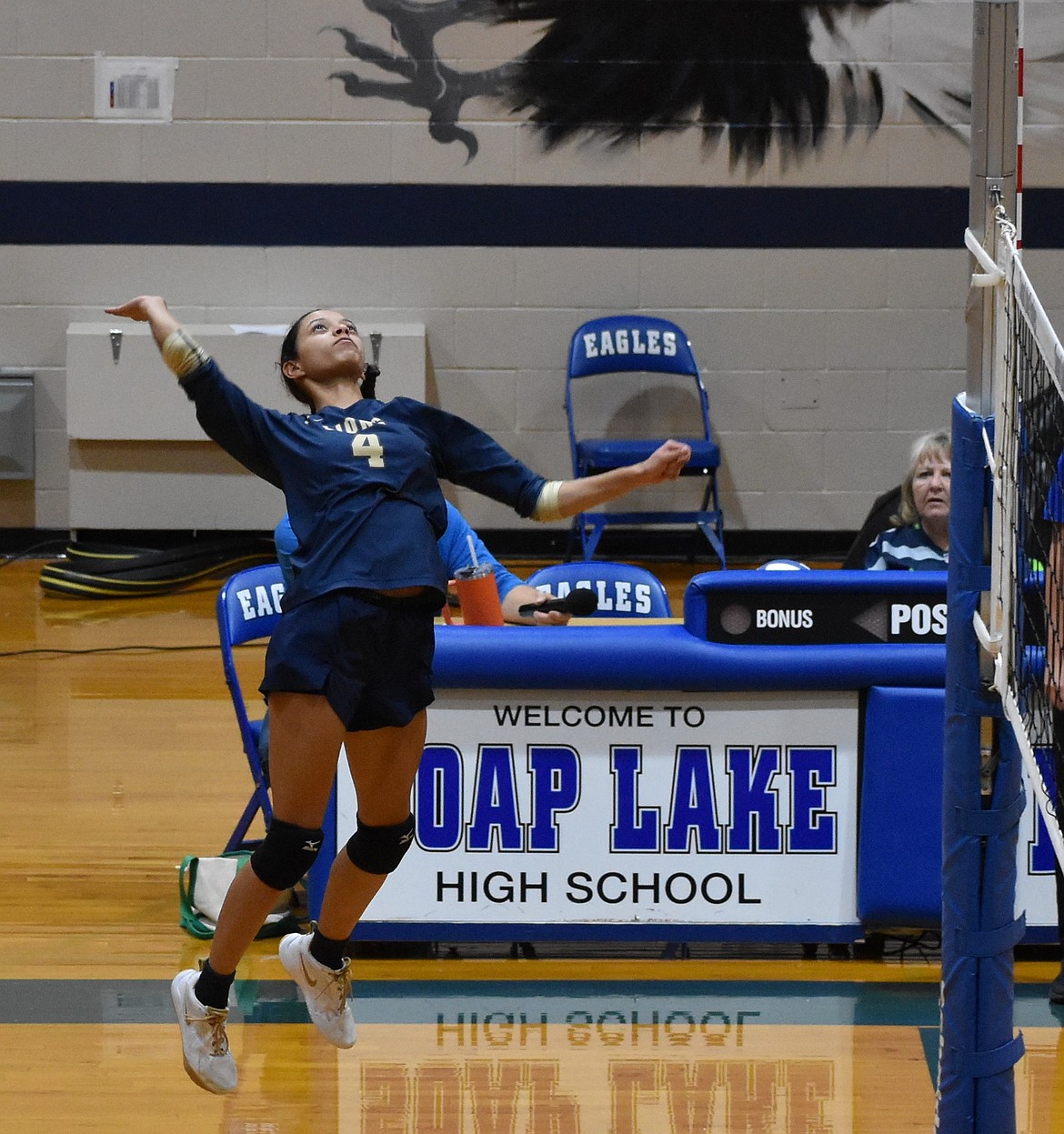 Lions senior SanTahna Ferguson leaps in the air for a huge hit against the Eagles. The Lions are preparing for a big home matchup for their Senior Night against Waterville-Mansfield on Thursday.