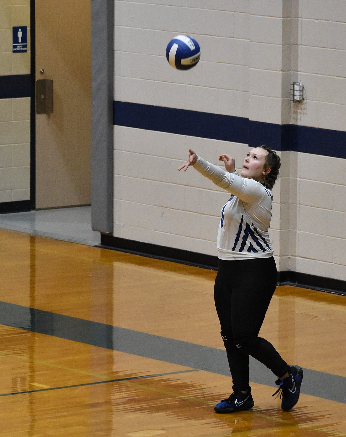 Eagles senior Maryanna Miller serves the ball during Tuesday’s game against the Lions. Eagles head coach Niki Noble said it is important for the team to play to their fullest potential as they head into their final game of the regular season.