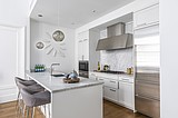 Two-tone cabinets, quartz counters in style for kitchen remodels