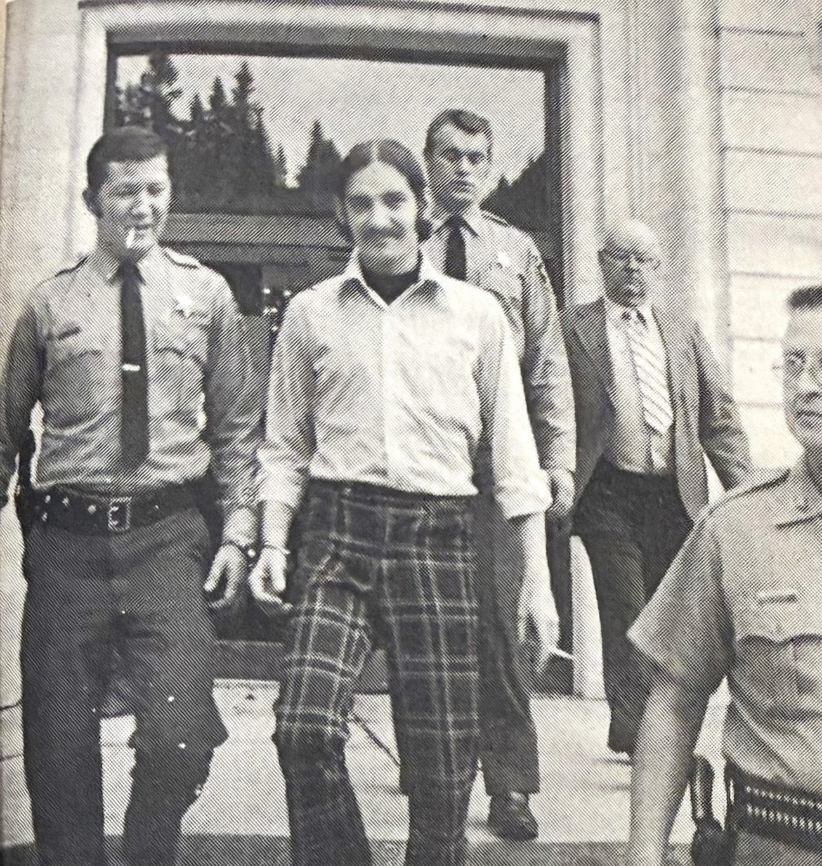 Serial killer Thomas Eugene Creech, then 25, is escorted from the Shoshone County Courthouse during his 1975 double murder trial.