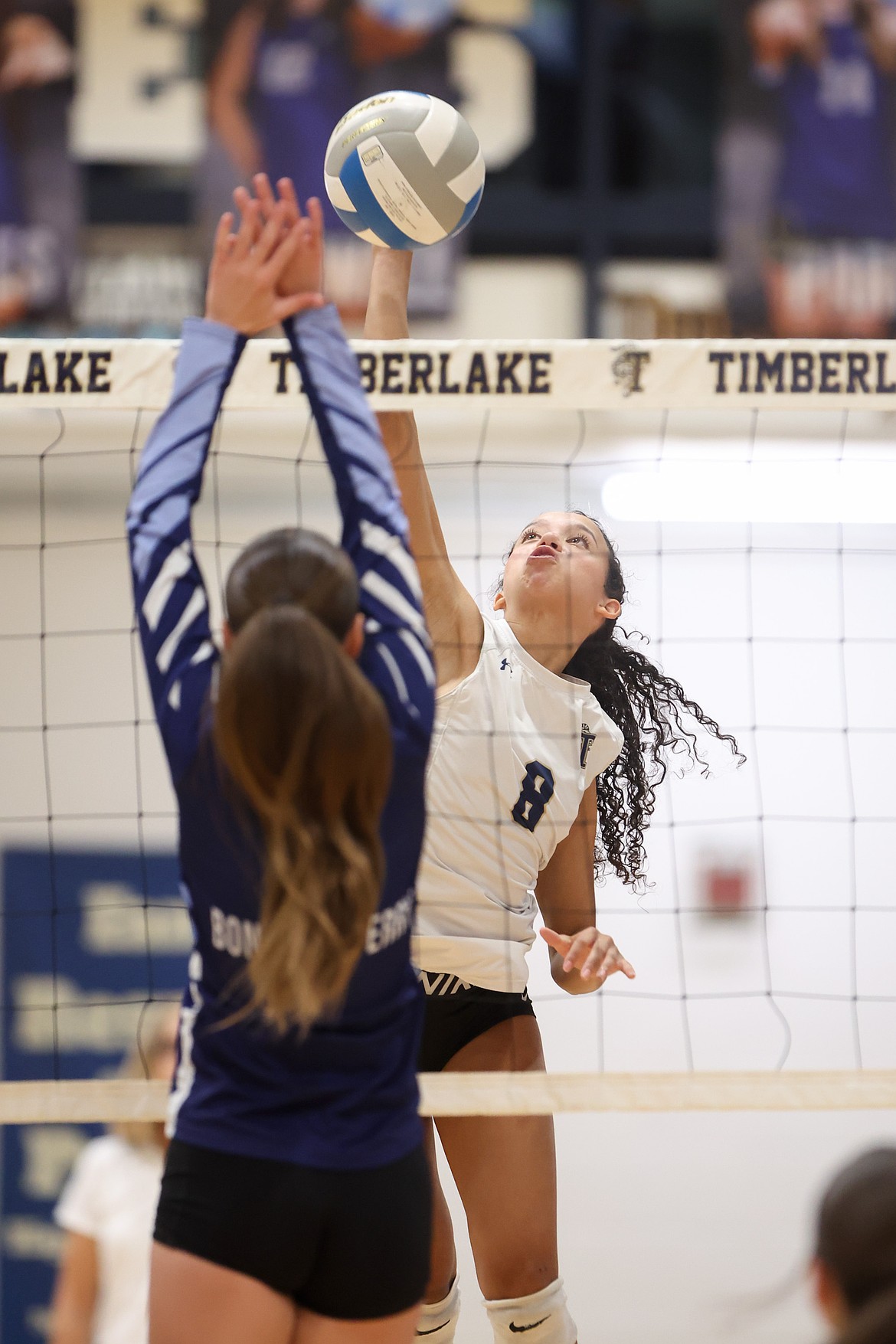 JASON DUCHOW PHOTOGRAPHY
Timberlake senior outside hitter Amarijana Olivieri hits the ball over a Bonners Ferry blocker during the second game of the 4A District 1 best-of-3 series at Timberlake High.