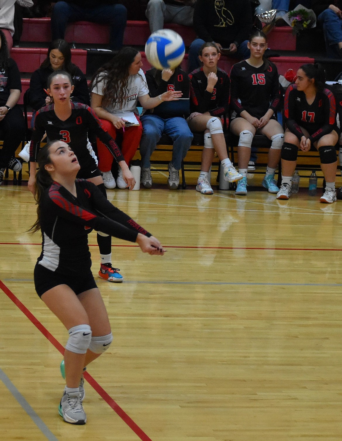 Huskies senior Chloe Purdy gets ready to set the ball up for a big hit during Wednesday’s game against the Jacks. Purdy said it was an emotional game for the seniors, but the team found the energy to get the win.