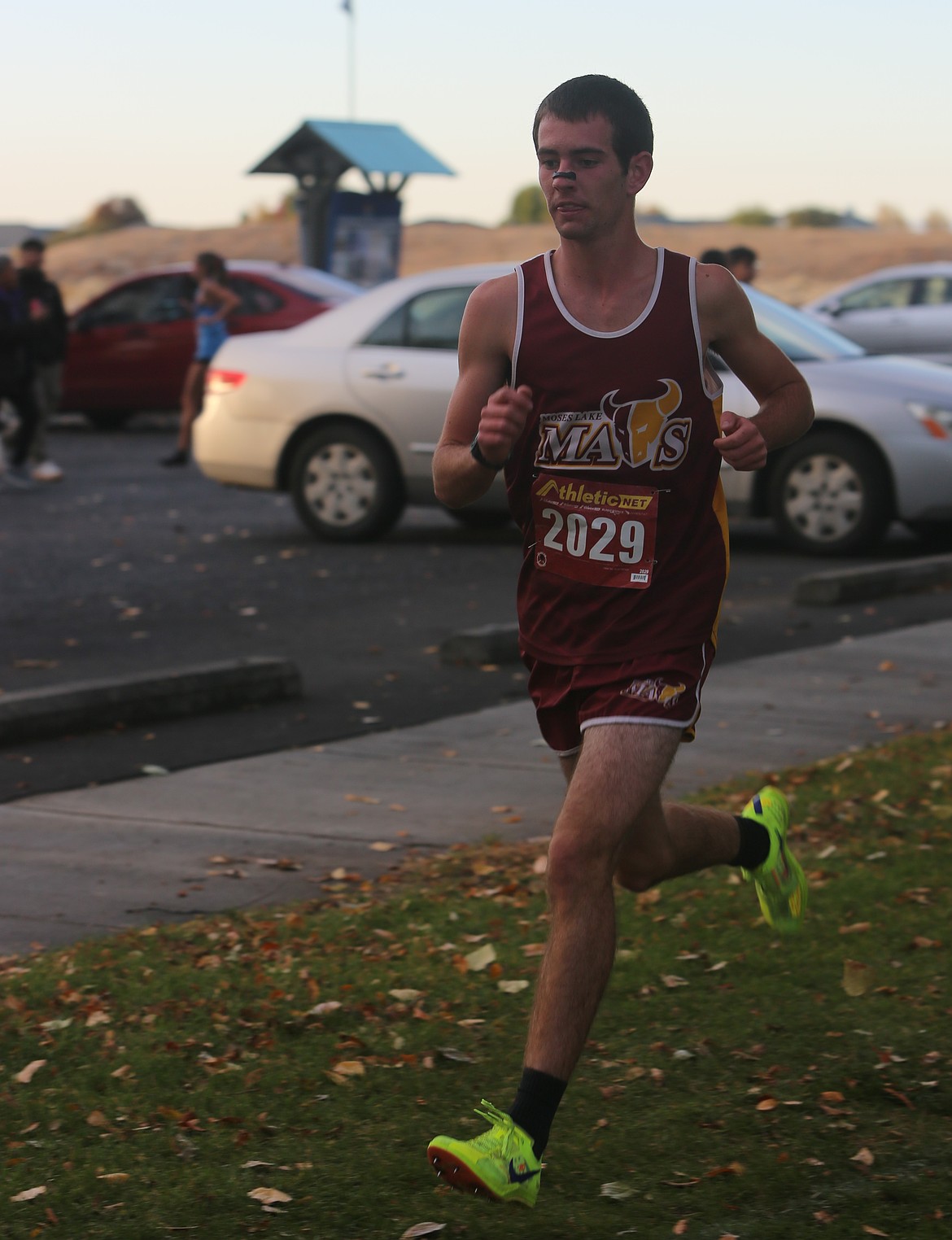 Colton Lucero keeps pace during his 5K race at the Big 9 league meet on Tuesday. Lucero ran a 16:31.4 to move up to seventh all time in school history for boys.