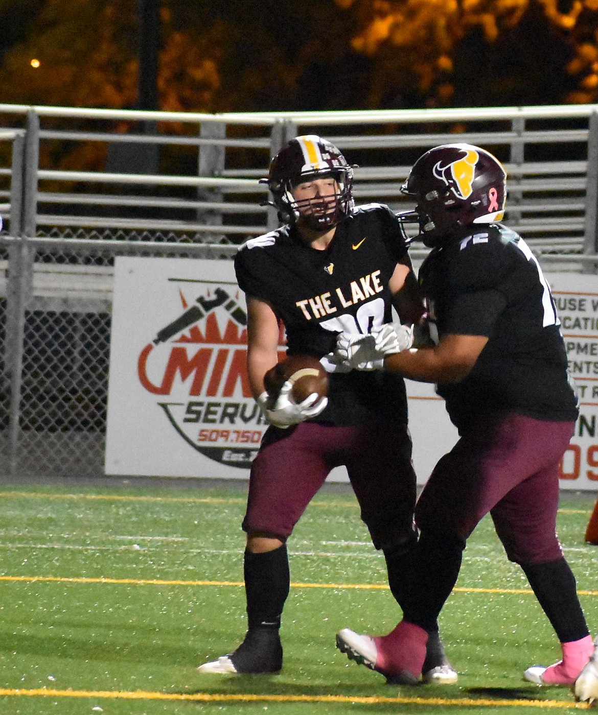 Mavs senior running back Cooper Lamb (20) is met by teammate Jeremiah Pena (72) after Lamb ran in for a touchdown during Friday’s game against West Valley. This was the Mavs final home game of the regular season.